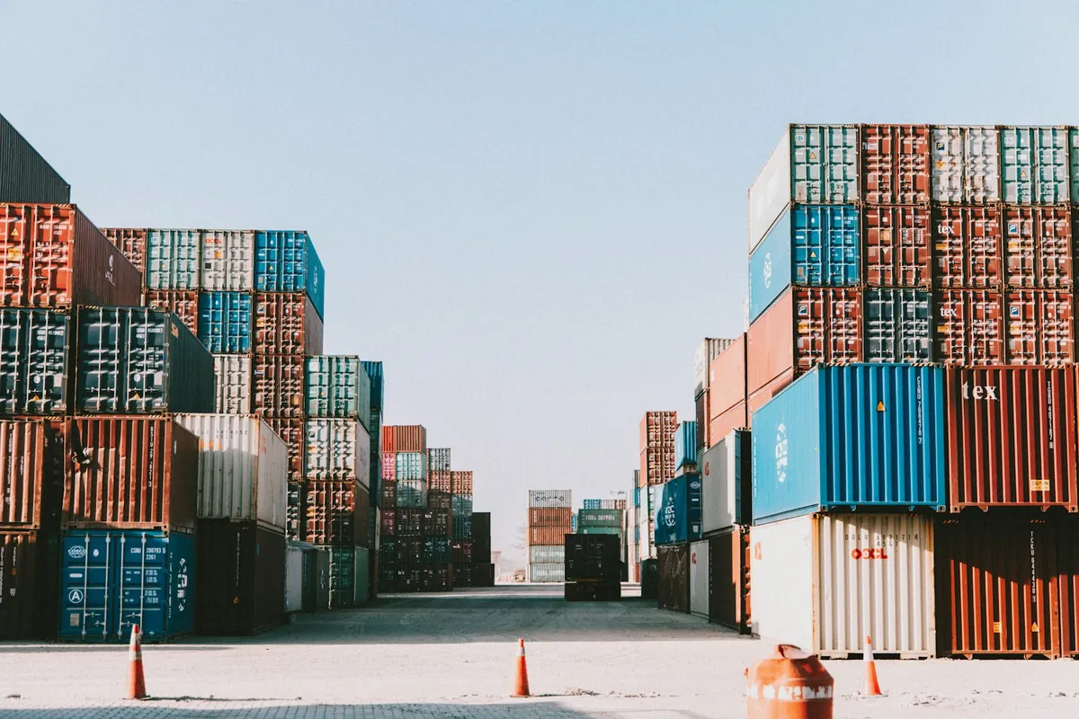 Stacked shipping containers in a yard