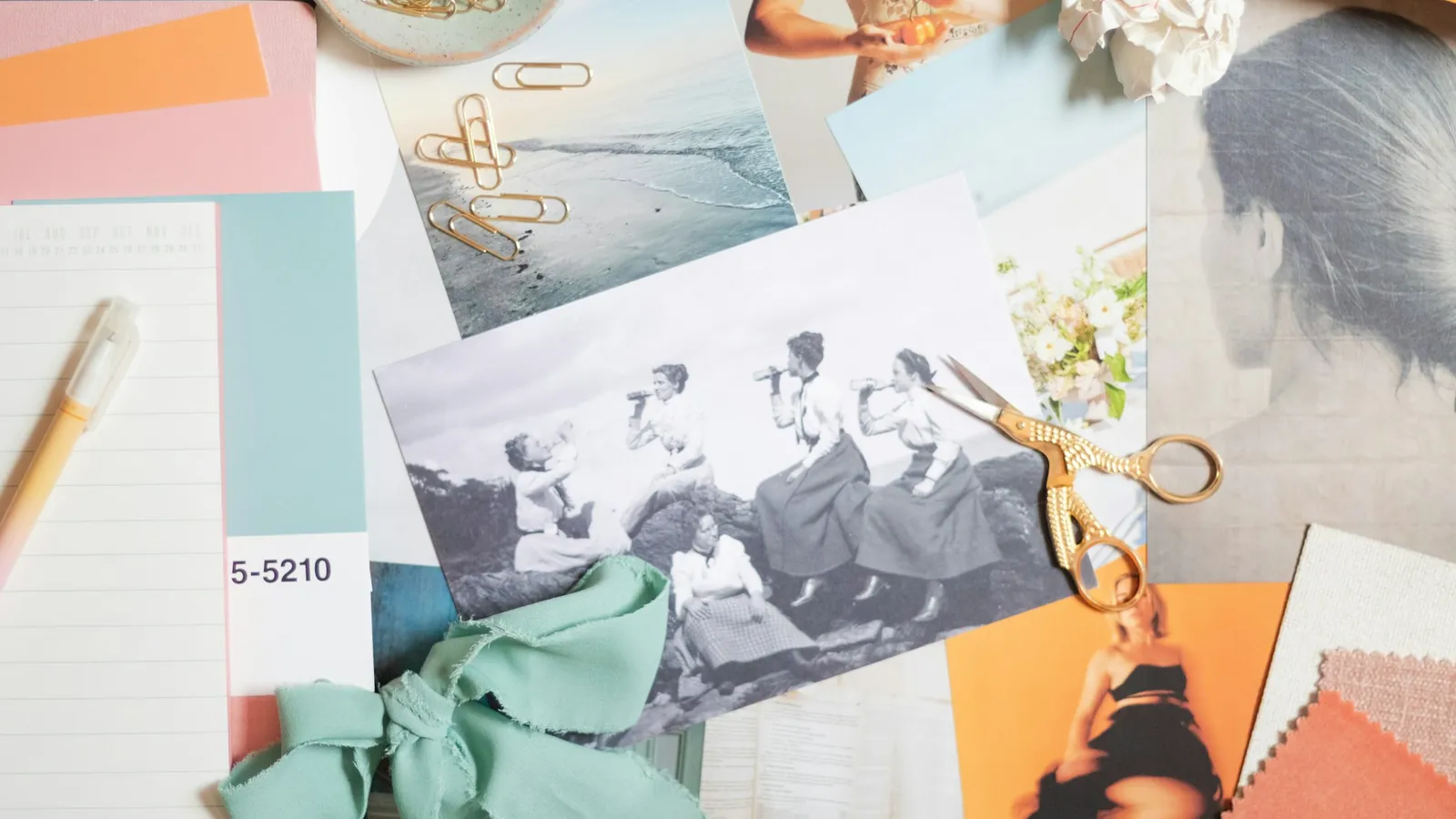A designer moodboard of photos, swatches and paper