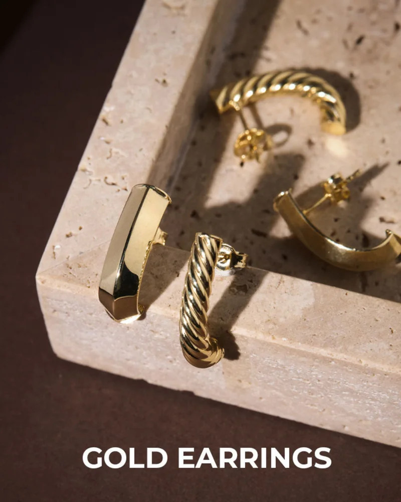 Ferkos Fine Jewelry gold earrings photography