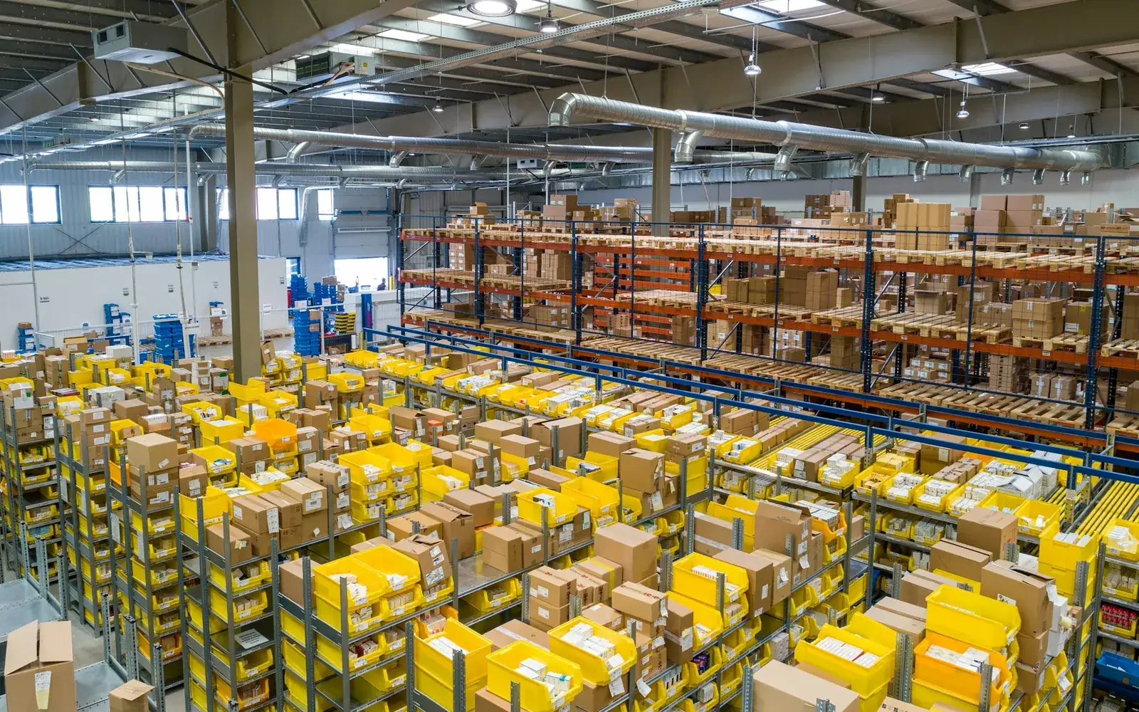 A warehouse team checking stock against orders