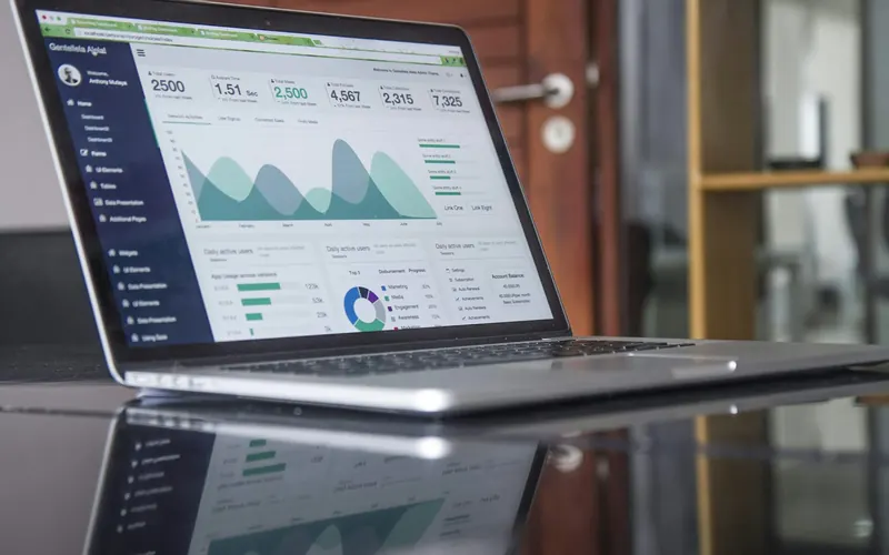 Automated reporting dashboard on a laptop